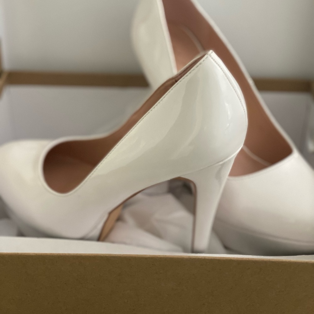 Elisabet Tang white stilettos